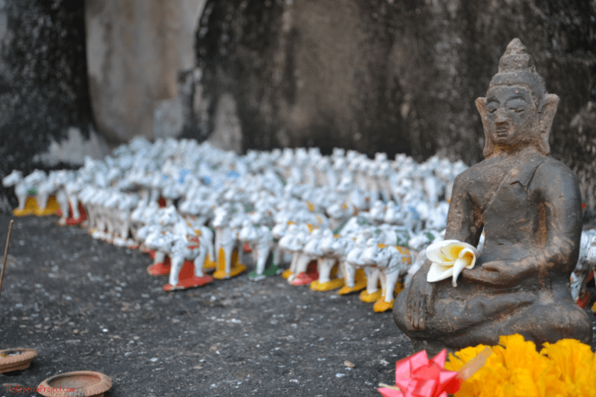 Minature buddha with an elephant army. 