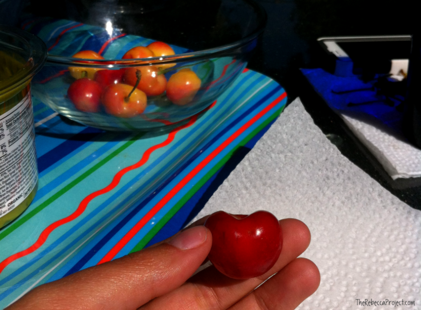 Enjoying summer's bing cherries and good conversation.